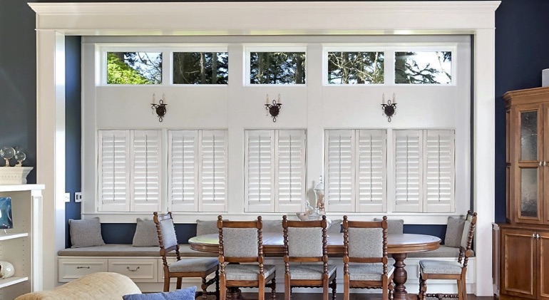 Clearwater dining room with white plantation shutters.